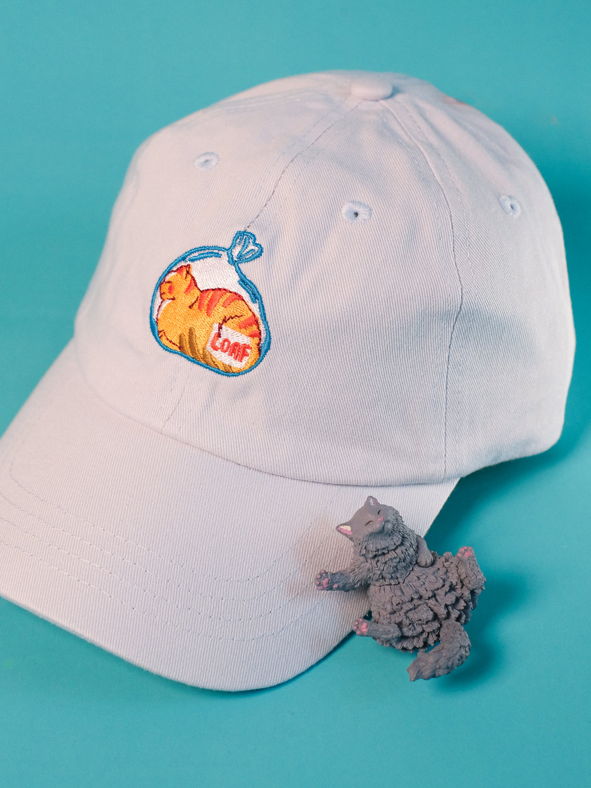 Happy Loafing Cat | Pastel Blue Hat
