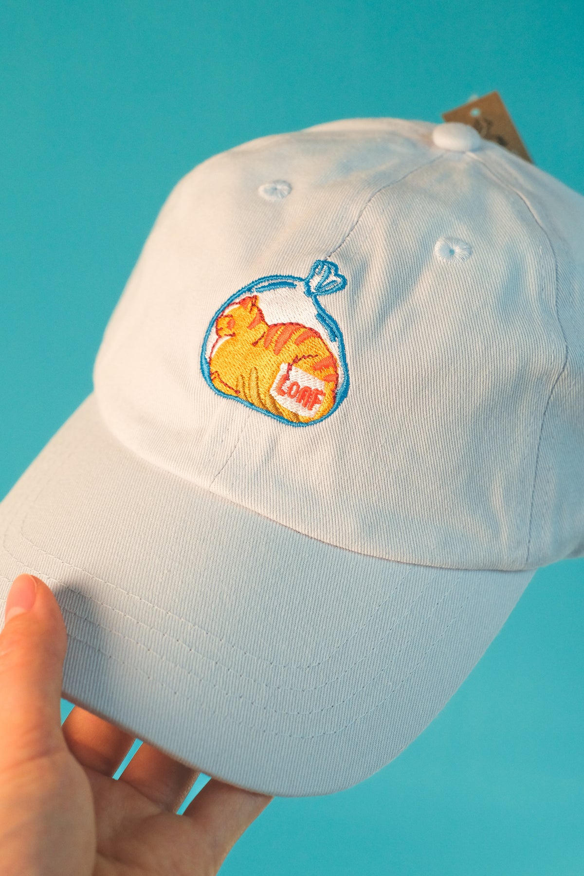 Happy Loafing Cat | Pastel Blue Hat