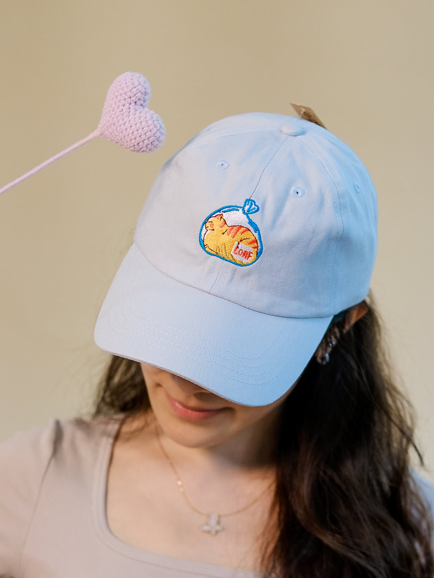 Happy Loafing Cat | Pastel Blue Hat